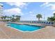 Outdoor pool with lounge chairs overlooking the ocean at 2701 S Ocean Blvd. # 1009, North Myrtle Beach, SC 29582