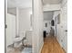 A view from the hallway showcasing a bathroom with a shower and a glimpse into the living room at 281 Encore Circle, Myrtle Beach, SC 29579