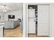 A view of the laundry area and closet, situated in the open-concept living space featuring wood flooring at 281 Encore Circle, Myrtle Beach, SC 29579