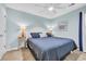 Comfortable bedroom with soft lighting, cool colors and coastal decor at 299 Lake Arrowhead Rd., Myrtle Beach, SC 29572