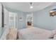 Comfortable bedroom with soft lighting, cool colors, and adjacent bathroom at 299 Lake Arrowhead Rd., Myrtle Beach, SC 29572