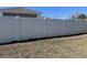 Well-maintained white vinyl privacy fence enclosing the backyard at 3009 Woodbury Ct., Conway, SC 29527