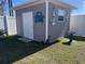 Charming backyard shed with coastal decor and white trim at 3009 Woodbury Ct., Conway, SC 29527