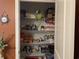 Closet with shelving and an assortment of household items, cleaning supplies and decor at 3009 Woodbury Ct., Conway, SC 29527