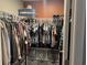 Walk-in closet with clothing racks, grey bins, and closet organizers at 3009 Woodbury Ct., Conway, SC 29527