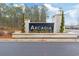 Elegant community entrance sign with landscaped surroundings at 3011 Visionary Dr., Myrtle Beach, SC 29588