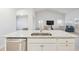 Kitchen island with granite counters, stainless steel dishwasher, and views of the living room at 3011 Visionary Dr., Myrtle Beach, SC 29588