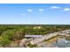 Overhead view of the condo complex at 306 Kiskadee Loop Unit #F, surrounded by lush trees at 306 Kiskadee Loop # 4-F, Conway, SC 29526