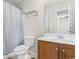 Clean bathroom featuring a toilet, shower with curtain, vanity and mirror at 306 Kiskadee Loop # 4-F, Conway, SC 29526