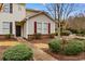 Inviting exterior of a well-maintained townhome showcasing manicured landscaping and a welcoming entrance at 306 Kiskadee Loop # 4-F, Conway, SC 29526