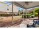 Relaxing screened porch with outdoor seating and a view of the backyard at 306 Kiskadee Loop # 4-F, Conway, SC 29526