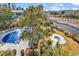 Overhead shot of the community pool area, highlighting the proximity to waterway at 311 69Th Ave. N # 404, Myrtle Beach, SC 29572