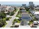 An aerial view shows the layout of the neighborhood with views of the beach and the ocean at 317 23Rd Ave. N, North Myrtle Beach, SC 29582