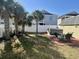 Lush backyard with a hot tub, shed, outdoor furniture and well-maintained lawn at 317 23Rd Ave. N, North Myrtle Beach, SC 29582