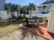 Backyard featuring a hot tub, shed, and outdoor furniture on a stone paver patio at 317 23Rd Ave. N, North Myrtle Beach, SC 29582