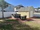 Backyard featuring a hot tub, shed, and outdoor furniture on a stone paver patio at 317 23Rd Ave. N, North Myrtle Beach, SC 29582