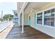 Spacious covered deck with ceiling fan, ideal for outdoor dining and entertaining with ocean breeze at 317 23Rd Ave. N, North Myrtle Beach, SC 29582