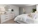 Cozy main bedroom featuring soft lighting, light dresser and decorative mirror at 348 Rookroost Circle, Conway, SC 29526