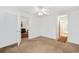 Bright bedroom featuring neutral carpet and an open door leading to other living spaces at 3567 Chestnut Dr. # 3567, Myrtle Beach, SC 29577