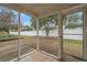 Enclosed porch with tile floors and view of the backyard, protected by a privacy fence at 3567 Chestnut Dr. # 3567, Myrtle Beach, SC 29577