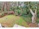 Backyard area with a variety of trees and plant life at 39 Lazy Hammock Trail, Pawleys Island, SC 29585