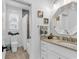 Bright and charming bathroom featuring a modern vanity and a walk-in shower at 39 Lazy Hammock Trail, Pawleys Island, SC 29585