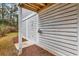 An outdoor shower with white wooden planks, perfect for rinsing off after a day at the beach at 39 Lazy Hammock Trail, Pawleys Island, SC 29585