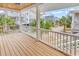 View of a porch overlooking a street with houses at 39 Lazy Hammock Trail, Pawleys Island, SC 29585