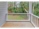 View of a porch overlooking a backyard with trees at 39 Lazy Hammock Trail, Pawleys Island, SC 29585