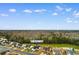 Aerial view of home at 401 Barton Loop featuring backyard pond and lush surroundings at 401 Barton Loop, Myrtle Beach, SC 29579