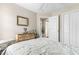 Bright bedroom with a white ceiling fan, dresser, white closet, and a comfortable bed at 401 Barton Loop, Myrtle Beach, SC 29579