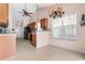 Cozy dining area with stylish chandelier and large windows overlooking backyard at 401 Barton Loop, Myrtle Beach, SC 29579