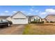 Charming single-story home with manicured lawn, two-car garage, and traditional design at 401 Barton Loop, Myrtle Beach, SC 29579