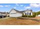 Charming single-story home with manicured lawn, two-car garage, and traditional design at 401 Barton Loop, Myrtle Beach, SC 29579