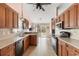 Traditional kitchen featuring wooden cabinets, modern appliances, and plenty of counter space at 401 Barton Loop, Myrtle Beach, SC 29579