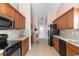 Traditional kitchen featuring wooden cabinets, modern appliances, and plenty of counter space at 401 Barton Loop, Myrtle Beach, SC 29579