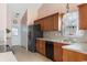 Traditional kitchen featuring wooden cabinets, modern appliances, and plenty of counter space at 401 Barton Loop, Myrtle Beach, SC 29579