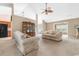 Inviting living room showing a large cabinet, two sofas and an open floor plan at 401 Barton Loop, Myrtle Beach, SC 29579