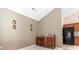 A bright living room showing a antique hutch and connecting to the kitchen at 401 Barton Loop, Myrtle Beach, SC 29579