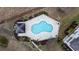 Aerial view of pool with lounge chairs and nearby gazebo at 4142 Hibiscus Dr. # 103, Little River, SC 29566