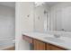 Bathroom featuring a wood vanity, white countertop, toilet and shower at 4387 Heartwood Ln., Myrtle Beach, SC 29579