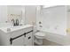 Bathroom featuring updated vanity with modern black fixtures, a shower-tub combination, and neutral finishes at 445 Mooreland Dr., Myrtle Beach, SC 29588