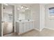 Bathroom featuring a double sink vanity with lots of storage and a glass-enclosed shower at 445 Mooreland Dr., Myrtle Beach, SC 29588