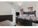 Bedroom with dark wood furniture and a bed with a geometric patterned bedspread at 445 Mooreland Dr., Myrtle Beach, SC 29588