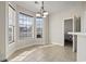 Bright breakfast nook with large windows and chandelier at 445 Mooreland Dr., Myrtle Beach, SC 29588