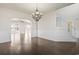 A dining room showcases hardwood floors, decorative trim and an open concept floor plan at 445 Mooreland Dr., Myrtle Beach, SC 29588