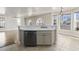 Kitchen island featuring sink, dishwasher, and storage at 445 Mooreland Dr., Myrtle Beach, SC 29588