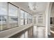 Sun room with lots of natural light and dark wood floors at 445 Mooreland Dr., Myrtle Beach, SC 29588