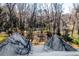 Backyard view from the roof shows mature trees at 474 Wraggs Ferry Rd., Georgetown, SC 29440