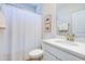 Clean bathroom featuring a shower and tub combination, white vanity, and modern fixtures at 474 Wraggs Ferry Rd., Georgetown, SC 29440